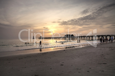 Hazy sunset over the Naples Pier in summer