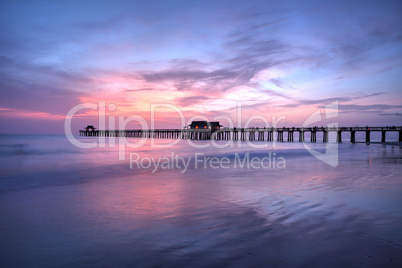 Pink and purple sunset over the Naples Pier