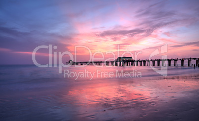 Pink and purple sunset over the Naples Pier