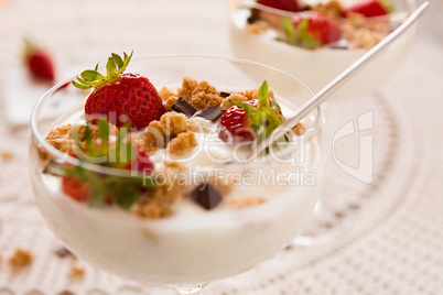 Close up of dessert with strawberries and yogurt