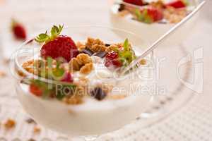 Close up of dessert with strawberries and yogurt