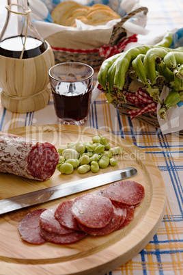 Meat chopping board of traditional Italian salami