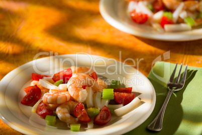Shrimp salad with squid tomatoes and celery