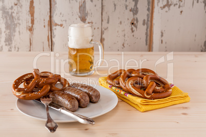 Bavarian cooked sausage and pretzel