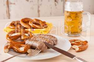 Bavarian cooked sausage and pretzel