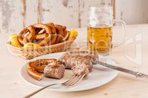 Bavarian cooked sausage and pretzel