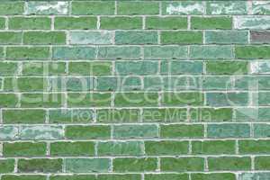 Wall from green brick background
