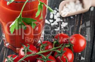Closeup of tomato juice and cherry tomatoes