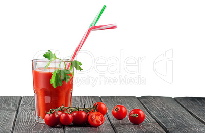 Glass of tomato juice with cocktail stick