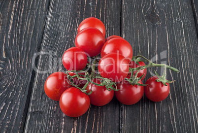 Two branches of cherry tomatoes