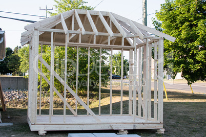 Wooden skeleton of a small building under construction