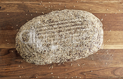bread from rye flour is strewn with sesame seeds