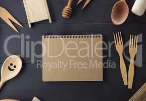 open notebook with blank pages in the middle of wooden kitchen i
