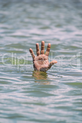 gesture for the help of a drowning man