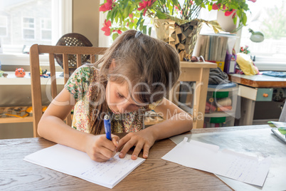 Girl writing  letter to girlfriend