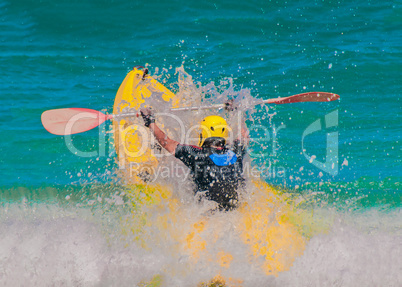 How to swim in a kayak through a large wave