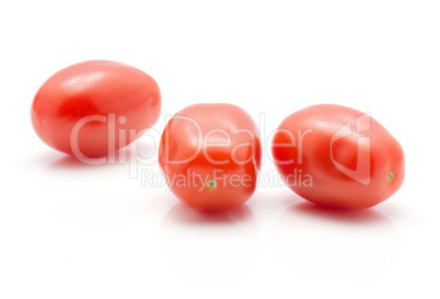 Red cherry tomatoes (bobulienka variety) isolated on white