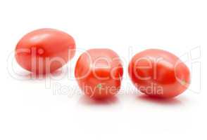 Red cherry tomatoes (bobulienka variety) isolated on white