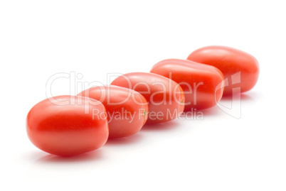 Red cherry tomatoes (bobulienka variety) isolated on white