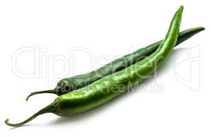 Green chilli pepper isolated on white