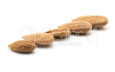 Raw almonds isolated on white