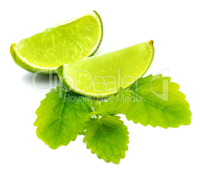 Fresh lime and melissa isolated on white