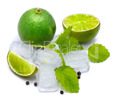 Fresh lime and melissa isolated on white