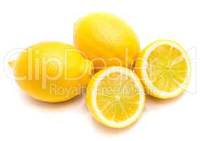 Group of two whole yellow lemons and two halves isolated on whit