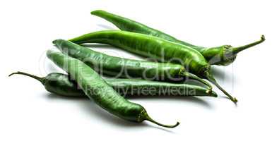 Green chilli pepper isolated on white