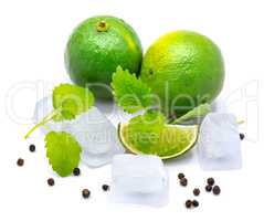 Fresh lime and melissa isolated on white
