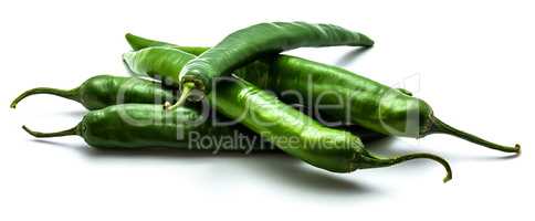 Green chilli pepper isolated on white