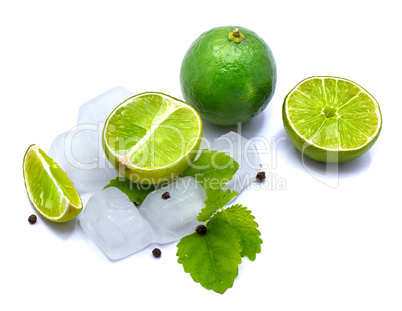 Fresh lime and melissa isolated on white