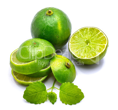 Fresh lime and melissa isolated on white