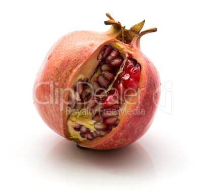 Fresh pomegranate isolated on white