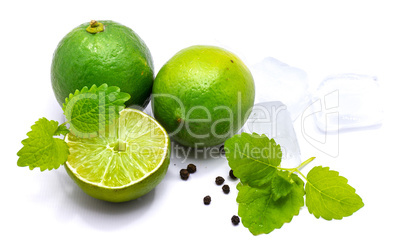 Fresh lime and melissa isolated on white