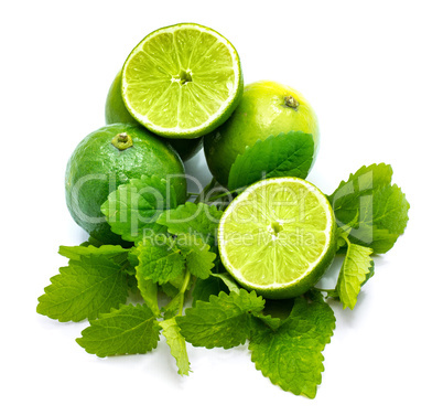 Fresh lime and melissa isolated on white