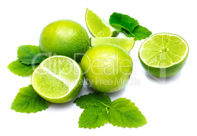 Fresh lime and melissa isolated on white