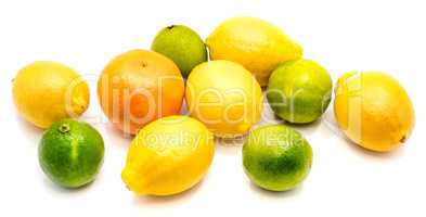 Fresh mixed citrus isolated on white