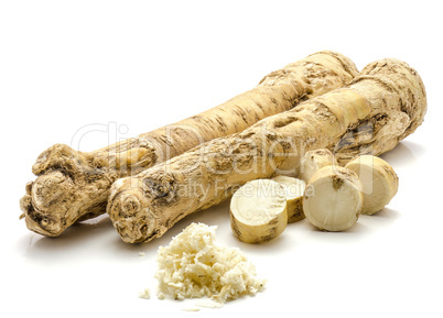 Fresh horseradish isolated on white