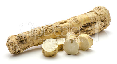 Fresh horseradish isolated on white