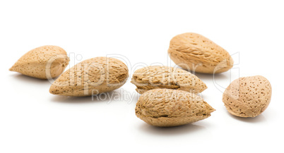 Raw almonds isolated on white