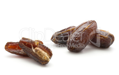 Dried date fruit isolated on white