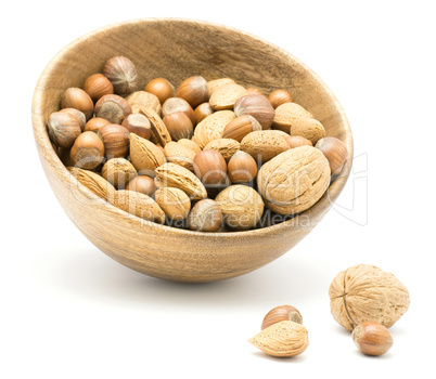 Raw mixed nuts isolated on white