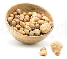 Raw mixed nuts isolated on white