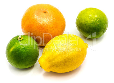 Fresh mixed citrus isolated on white