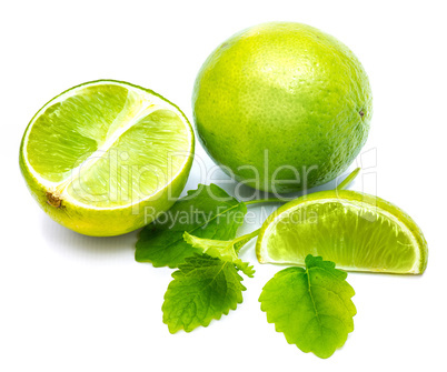 Fresh lime and melissa isolated on white