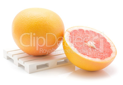 Red grapefruit isolated on white