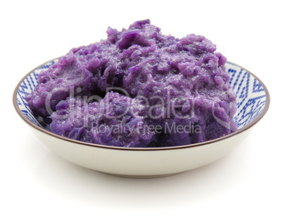 Fresh vitelotte potato isolated on white