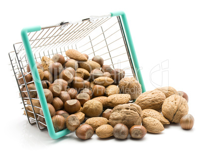 Raw mixed nuts isolated on white