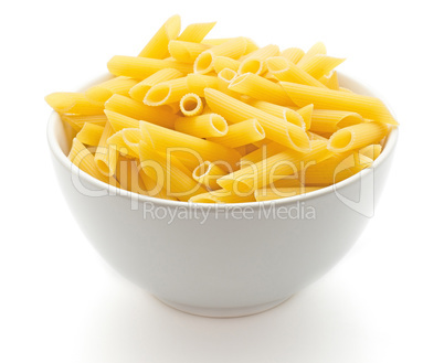 Raw fresh penne isolated on white